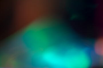 light leak overlay effect with scratch dust and colorful light leaks,retro grain noisy film flare on black background,analog old film burn overlay,abstract background with blur rainbow ray