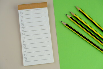 blank paper next to school tools with no word as a template for text space concept. business and education concept