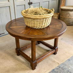 antique oak table round woven straw basket