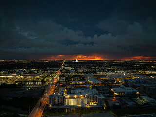 Dramatic storm clouds over Dania Beach area near Miami, Florida during evening aerial view
