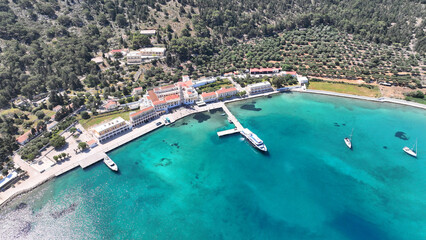 Aerial drone photo of iconic bay and holy Monastery of Archangel Michael Panormitis, Symi island,...