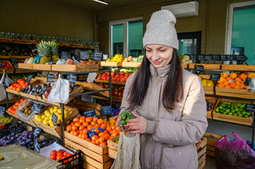 Woman Shopping for Fresh Fruits and Vegetables at Local Farmers Market