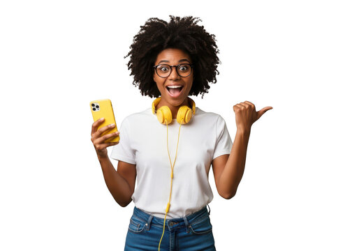 Excited african american woman holding smartphone wearing headphones and glasses pointing isolated on transparent background - Powered by Adobe