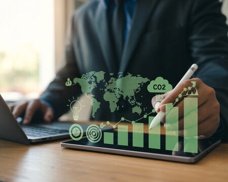 Businessman analyzing global C O2 emissions and financial growth