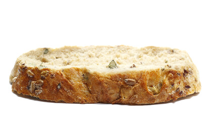 Fresh baked, slice of integral wheat bread, loaf with pumpkin, linseed, sunflower seeds and oatmeal isolated on white background, side view, clipping path