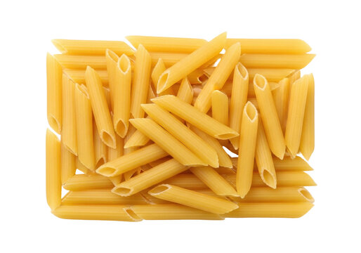 Isolated pile of raw penne pasta, uncooked pasta in a heap, uncooked golden food staple - Powered by Adobe