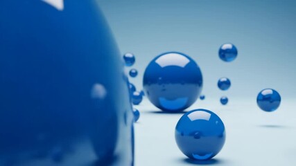 Abstract Blue Spheres - This video features a collection of glossy, three-dimensional blue spheres in varying sizes against a light blue backdrop. - Powered by Adobe