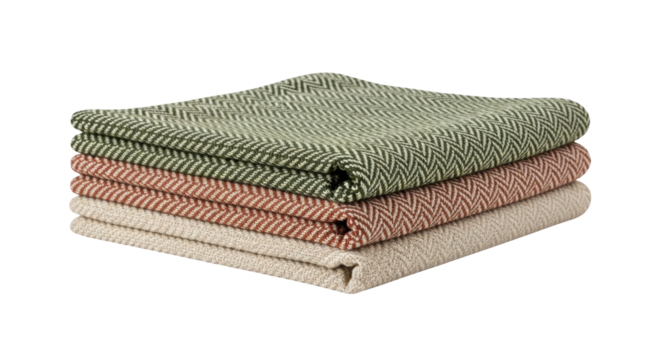 Isolated stack of three folded colorful cotton napkins with decorative herringbone pattern