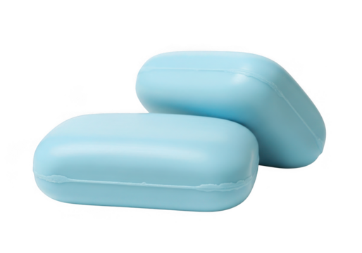 Two light blue bar soaps with rounded edges isolated on transparent background