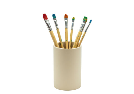 Isolated set of paintbrushes in holder, artist's drawing equipment, art studio supplies