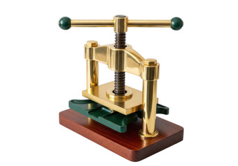 Isolated brass book press features green handles and a wooden base for bookbinding tasks