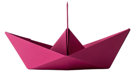 Isolated magenta origami paper boat floats, crafted from a single sheet of folded paper craft
