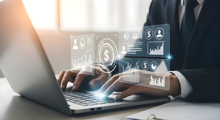 Businessman analyzing financial data on laptop with holographic display of charts and graphs