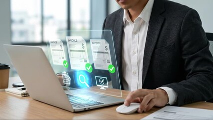Businessman Managing Digital Invoices with Futuristic Augmented Reality Interface on Laptop in Modern Office, Highlighting Paperless Financial Mana... - Powered by Adobe