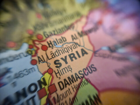 Warsaw, Poland - November 28, 2025: A detailed close-up of a map highlighting Syria, showcasing major cities like Aleppo, Homs, and Lattakia, reflecting geopolitical contexts.