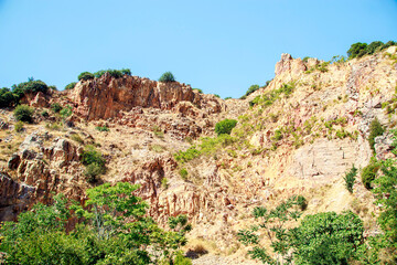 Fototapeta premium red rocks in the mountains in summer, kinali island istanbul