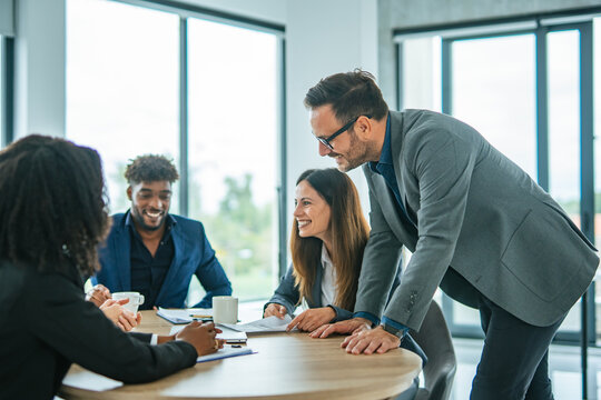 Diverse business team collaborating during office meeting