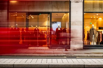 Fotobehang Londen rode bus Motion blurred crowd passing historic luxury storefront at golden hour, Regent Street London  © William
