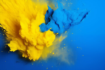 Explosion de poudre color&eacute;e jaune et bleue en plein impact sur fond bleu uni avec espace n&eacute;gatif copyspace pour visuel dynamique et cr&eacute;atif
