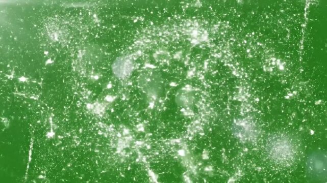 High-energy 3D animation of a vibrant confetti burst exploding outward over a clean green chroma key background. A dynamic celebratory pop releases multicolored paper strips, metallic