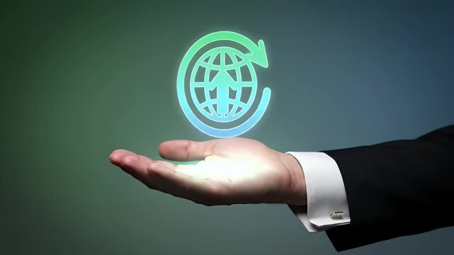 Hand in Suit Offering Symbolic Coin with Teal and Green Global Icon on Grey Gradient Background in Studio Lighting For Adobe Stock