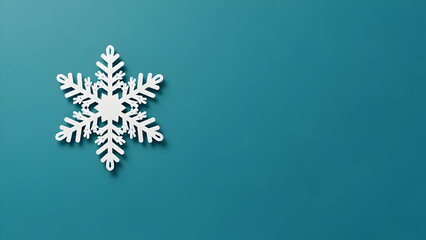 Fototapeta premium Teal Background with One Snowflake Cutout