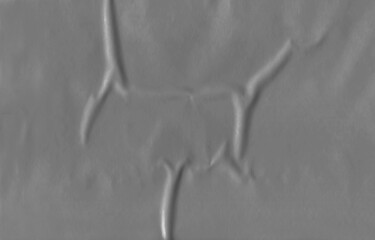 Gray crumpled plastic texture for abstract background, wallpaper, stickers, posters, billboards.