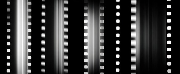 Obraz premium Negative film strips display striking light and subtle shadow variations with intricate detail