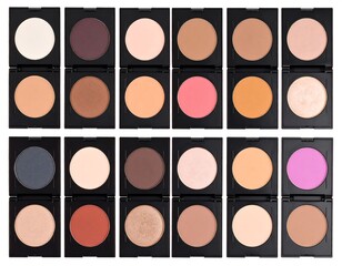 Fototapeta premium An array of round makeup pans in black compacts, showing a gradient of light to dark and various colors