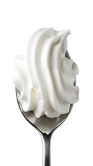 White whipped cream swirl on silver spoon isolated on white image