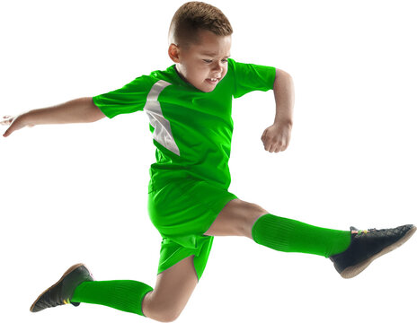 Young soccer player performing powerful high jump kick on transparent background. Concept of youth football training, action highlights, athletic movement, and sports marketing assets.