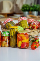Jars with preserved vegetables for the winter. Selective focus.