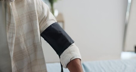 Blood pressure, check up and doctor with hands in clinic for medical exam, support and consulting. Healthcare, hospital and person with equipment to monitor for heart rate, wellness and hypertension