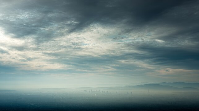 Panoramic view of Berlin city skyline with misty background buildings, hills, sunrise and sunset clouds, showcasing urban landscape, architecture, cityscape, travel, and scenic atmosphere