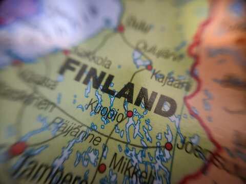 Warsaw, Poland - November 28, 2025: Close-up view of a map showing Finland emphasizing the location with vibrant detailing of lakes and towns, ideal for travel and geography-related content.