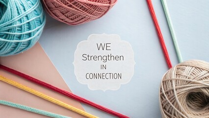 Flat lay showing yarn and threads with inspirational quote