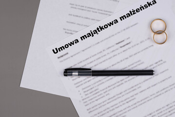Umowa majatkowa malzenska in Polish or Marriage contract, Marital Settlement Separation Divorce Agreement paper document, symbolizing divorce, prenuptial contract, prenup, breakup for Poland.