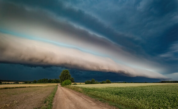 Super shelf, arcus storm cloud over the fields in summer, Lithuania