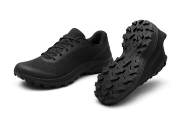 Pair of black athletic trail running shoes isolated on transparent background