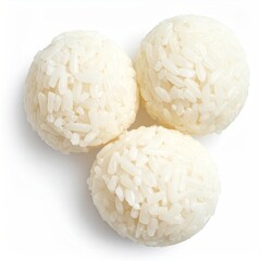 Three white rice balls isolated on a white surface