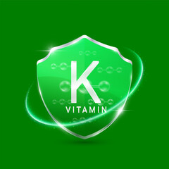 Molecules phytonadione vitamin K solution in translucent glass shield modern green surrounded by glowing ring. Vitamins immunity. For design cosmetics or supplement products. 3D Vector EPS10.
