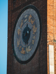 Torrazzo astronomical clock displaying zodiac signs, an historic symbol in Cremona, Lombardy, Italy