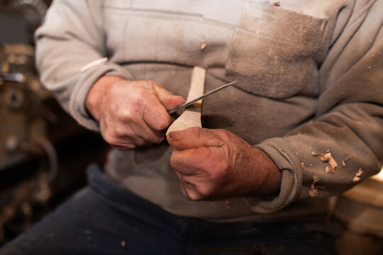 Woodworker Carving Wooden Bowl With Knife In Workshop Crafting Wood Products Woodworking Industry And Carpentr