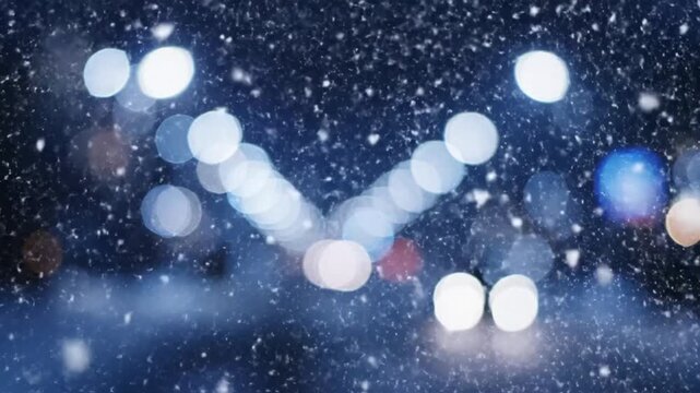 A magical winter Christmas background with beautiful bokeh light from a city street during a gentle falling snow storm
