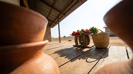 Rustic market display of fresh vegetables and fruits on a wooden table, perfect for promoting healthy eating or farm-to-table concepts.