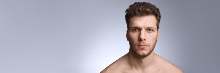 Male face marked on forehead and nose for contour planning. Concept of anatomy mapping visuals,...