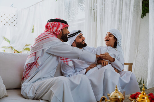 Arab family bonding, father and son relaxing - Powered by Adobe