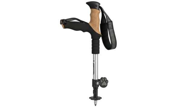 A hiking pole with a cork handle, black grip, and adjustable metal shaft, against black