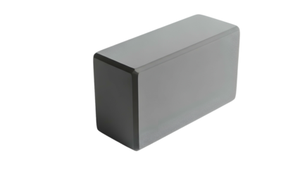A three-dimensional, rectangular, gray object with rounded edges, resting against black