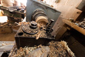 Woodworking Lathe Shaping Wood With Metal Tools In Workshop Carpentry Equipment For Wood Turning And Woodworking.